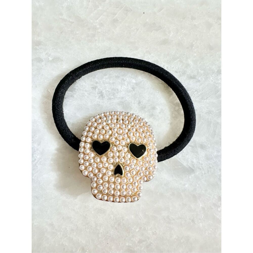 Adorable skull with heart eyes and faux pearl with rhinestone embellishment Hall